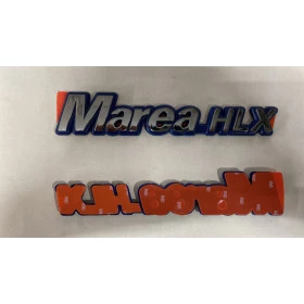 Emblema Letreiro Marea Hlx Cromado Com Fundo Azul